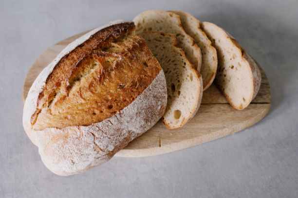bread on brown wooden chopping board
